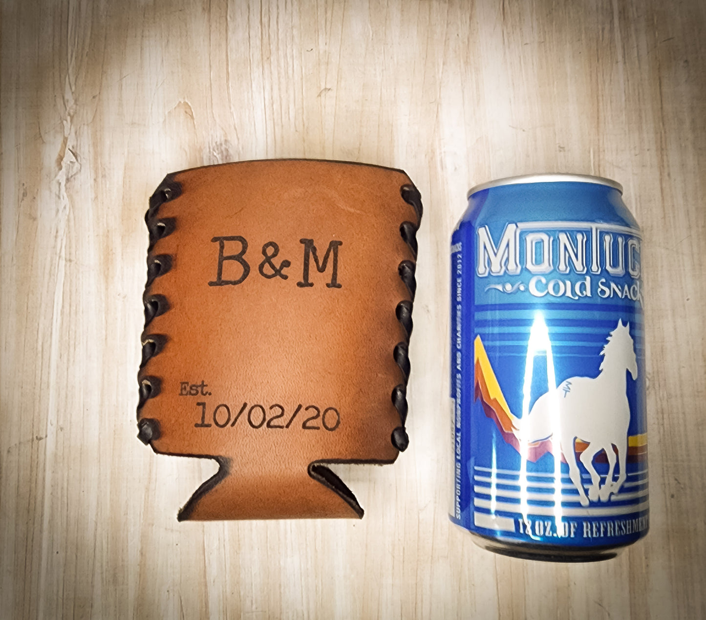 Premium leather anniversary can coozie.