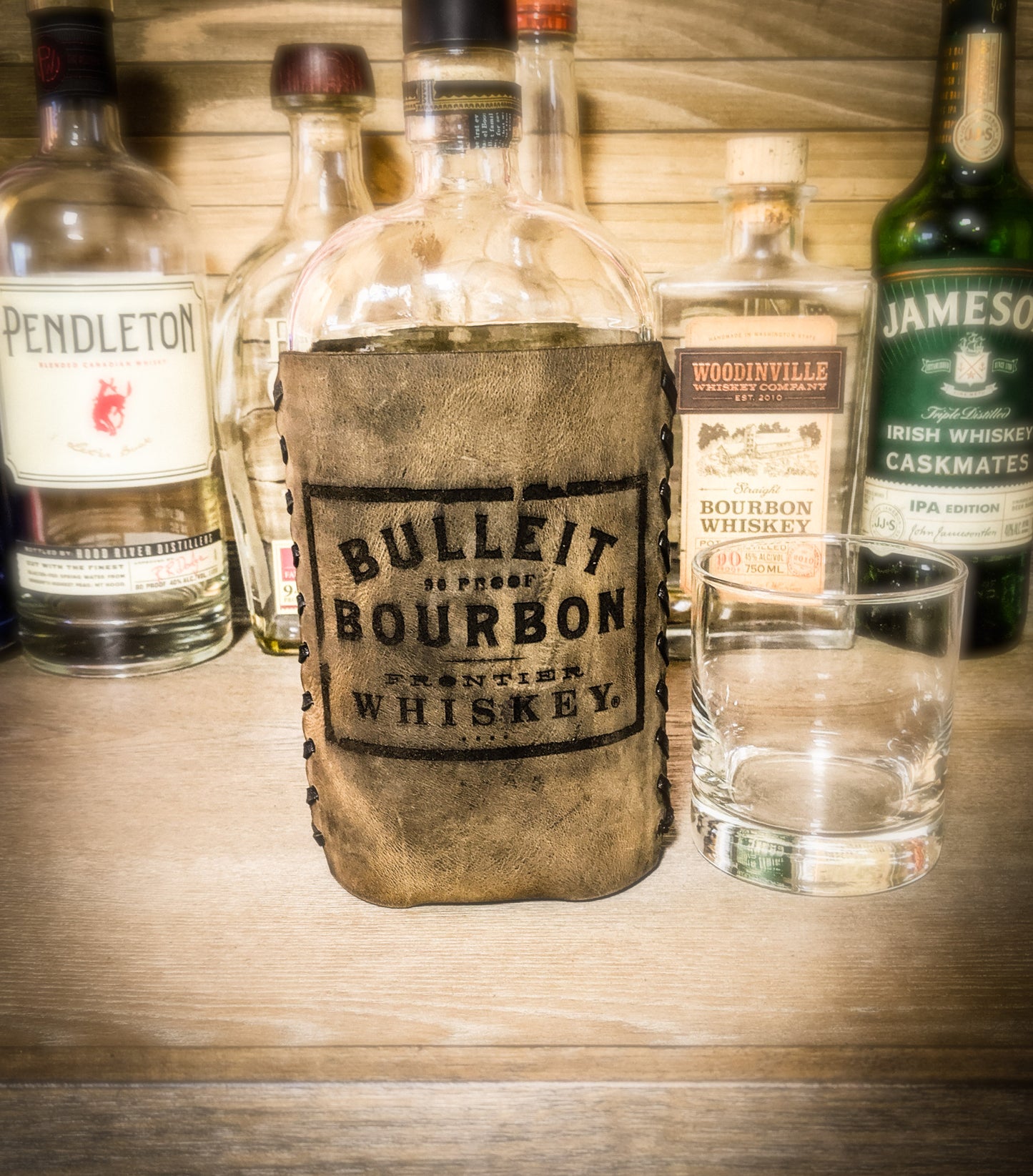 Leather whiskey set with leather wrapped whiskey glasses