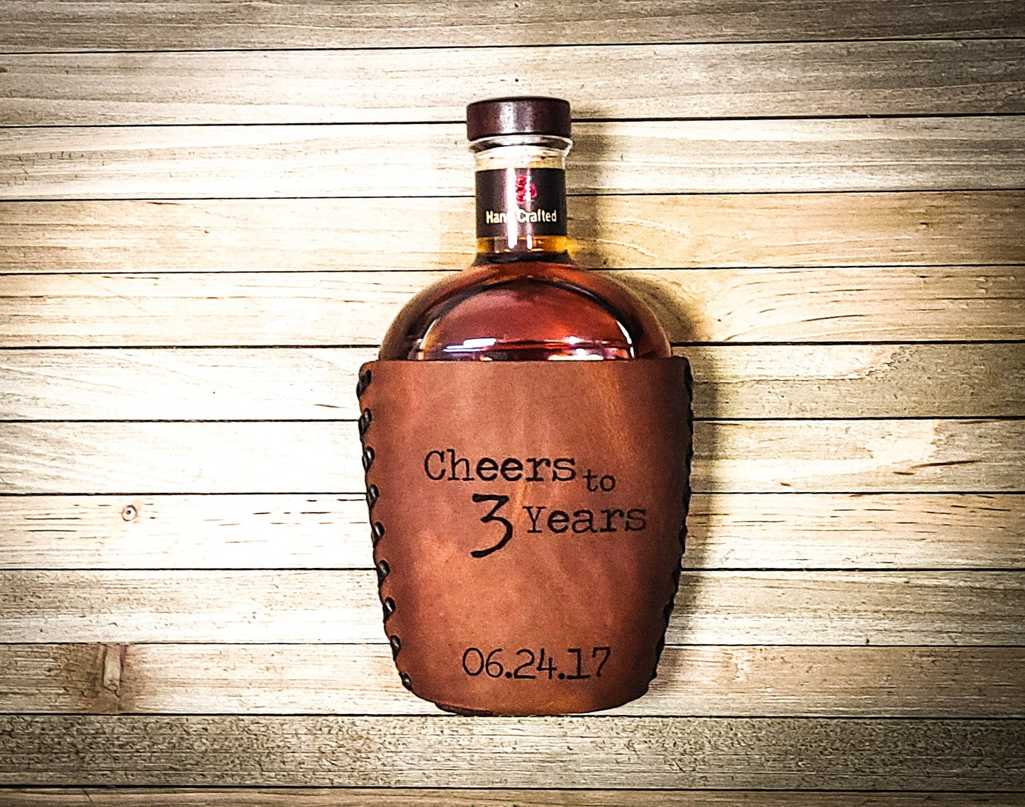 Three year wedding anniversary gift weather wrapped whiskey bottle with cheers to 3 years and wedding date engraved personalized through your wedding anniversary gift in leather