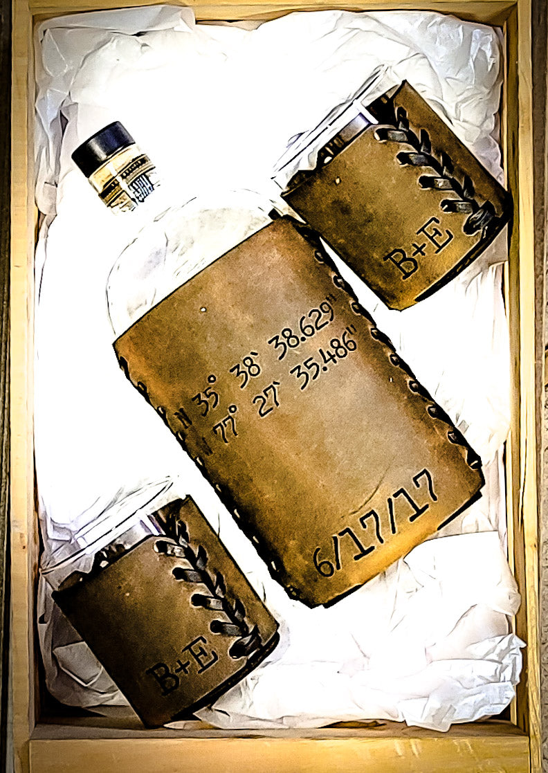 Leather whiskey set with leather wrapped whiskey glasses