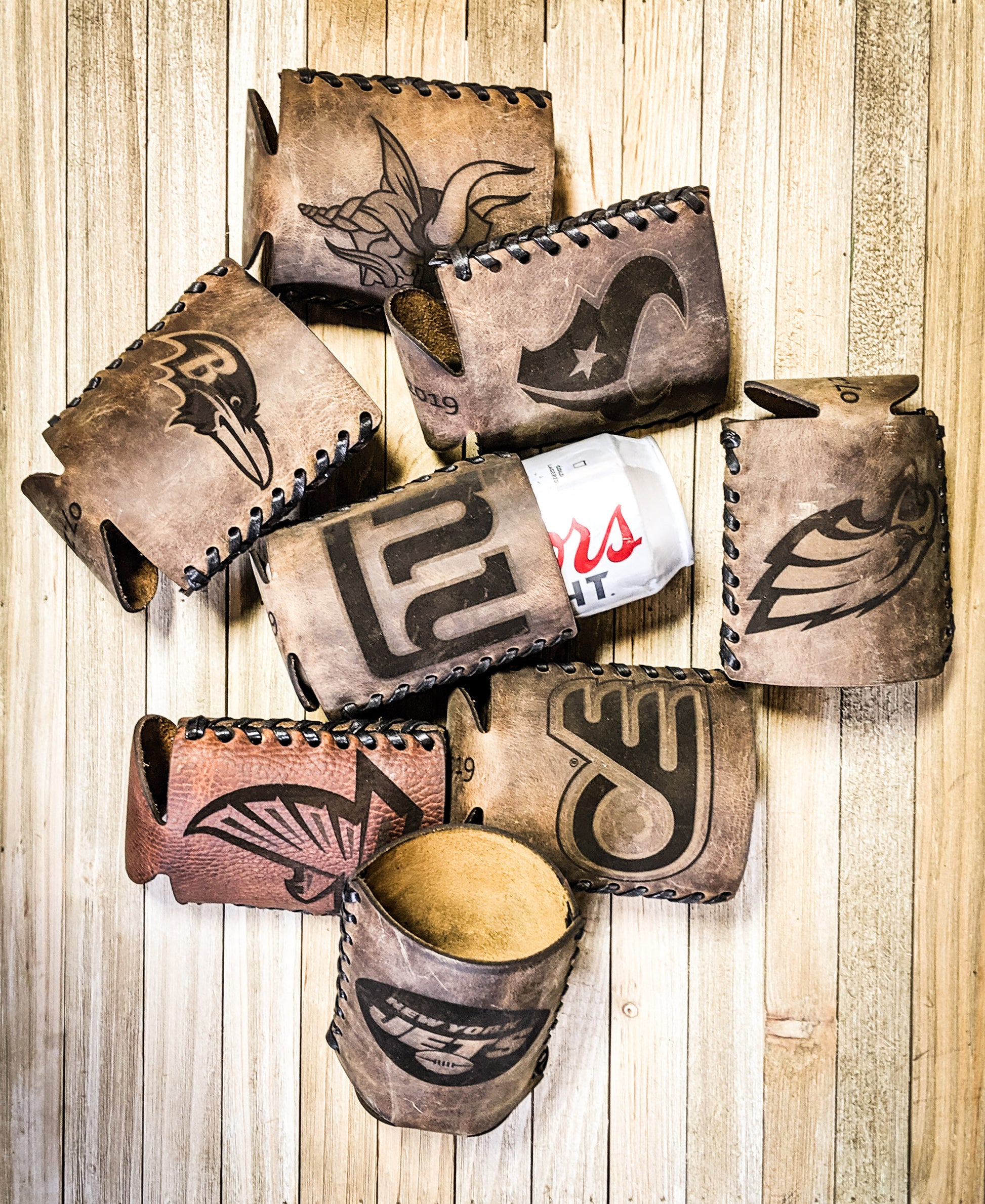 Premium leather football koozies with NFL teams perfect gift for men perfect Father's Day gift perfect Christmas gift for guys