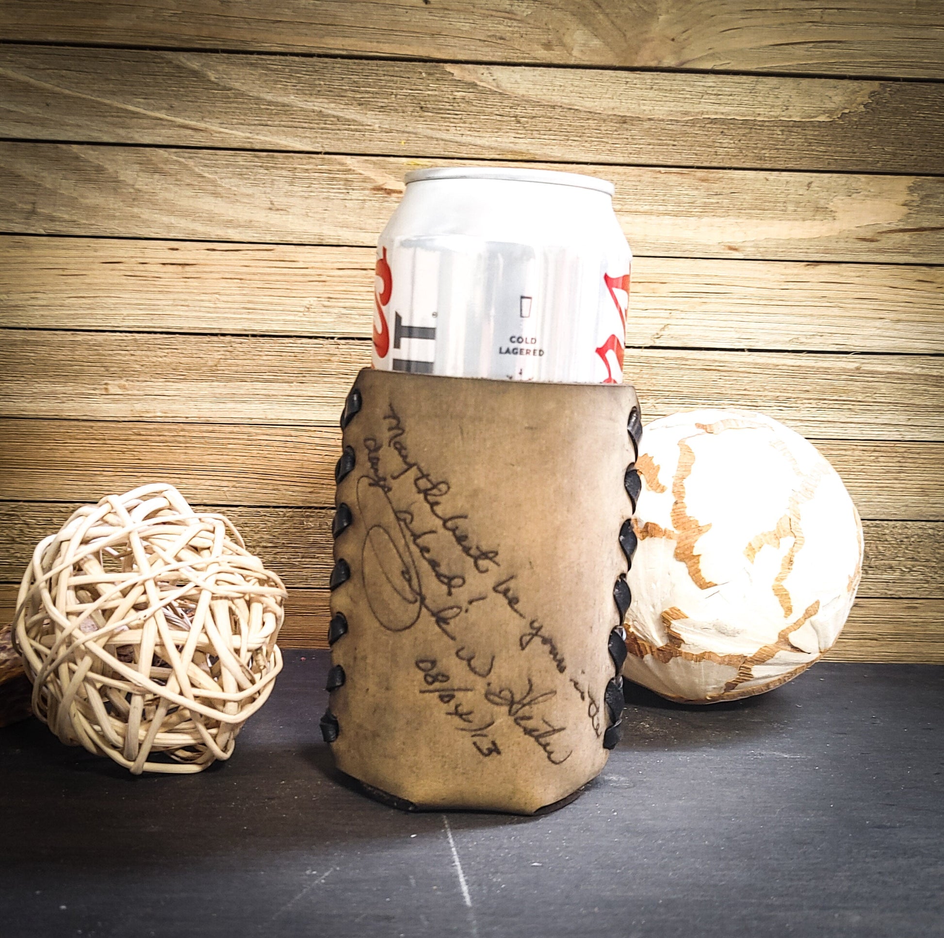 3-year wedding anniversary gift with handwritten message on brown leather koozie