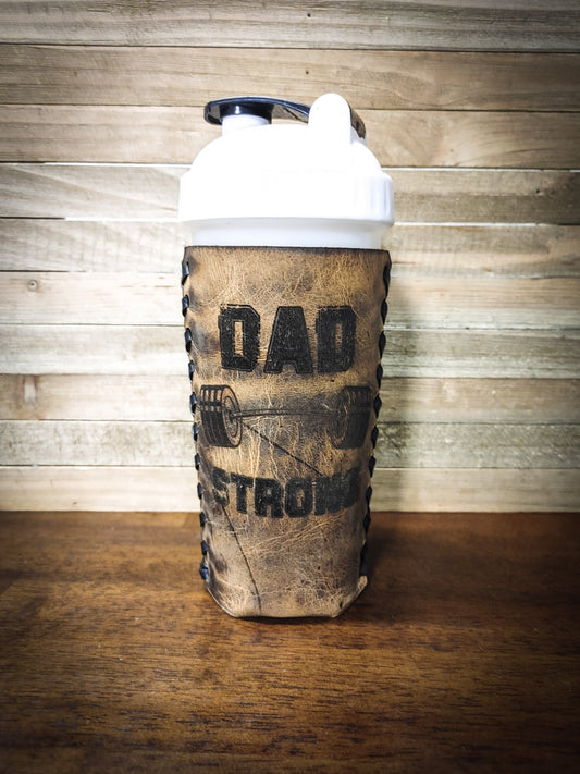 Premium leather blender bottle coozie says Dad strong engraved in dark brown leather perfect gifts for Dad's front Father's Day