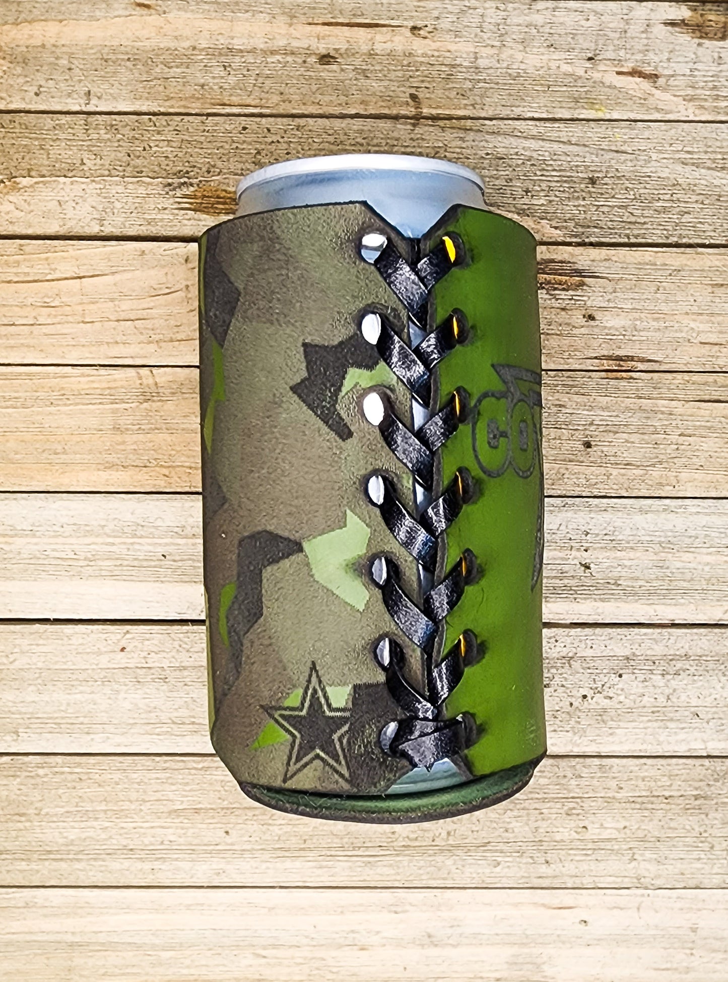 Side view of green leather personalized koozie with black lacing in a baseball pattern stitch personalized gift for cowboy fans