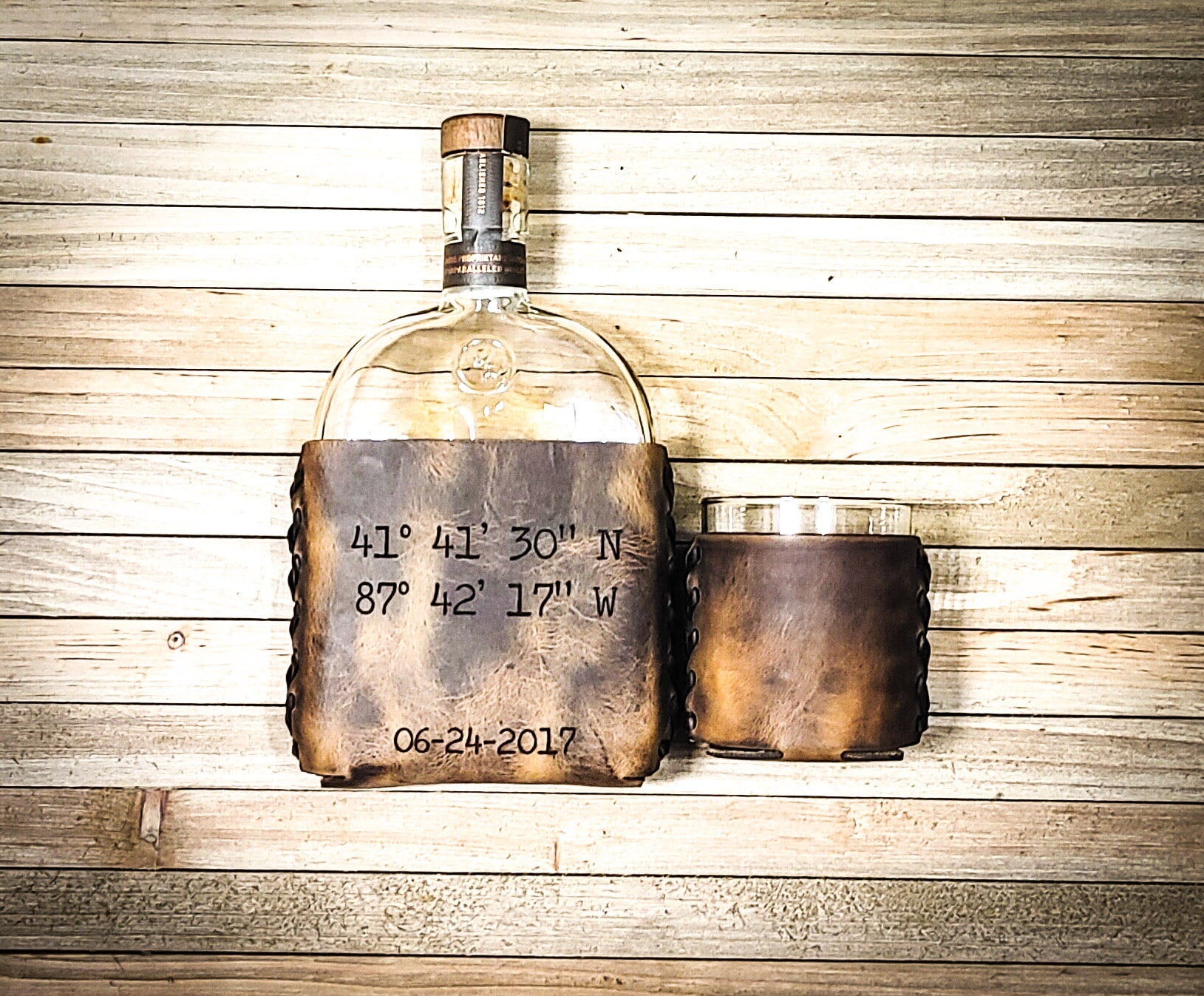 Wedding anniversary koozie with wedding coordinates on whiskey bottle with one leather wrapped whiskey glass 3 year wedding anniversary gift